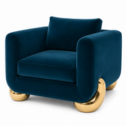 Caillou Armchair in navy velvet with polished gold bronze feet, front view